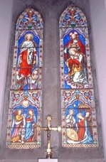 Photo of “The Immaculate Conception” Stained glass window in the church in Farran.